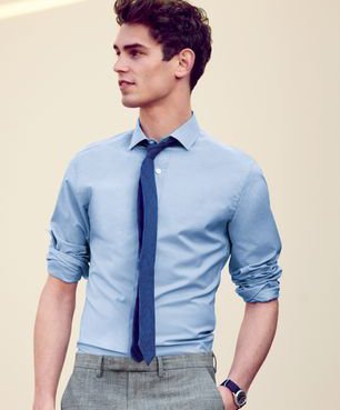 What color shirt goes with gray slacks & a teal colored tie?